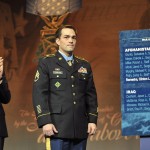 Secretary of the Army John McHugh, left, applauds as former Army Staff Sgt. Clinton L. Romesha stands beside the Hall of Heroes plaque bearing his name during a ceremony at the Pentagon in Arlington, Va., 12 Feb., 2013. A day earlier, Romesha received the Medal of Honor during a ceremony at the White House in Washington, D.C., for his actions during the Battle of Kamdesh at Combat Outpost Keating in Nuristan province, Afghanistan, 3 Oct., 2009. Romesha was a section leader with Bravo Troop, 3rd Squadron, 61st Cavalry Regiment, 4th Brigade Combat Team, 4th Infantry Division at the time of the battle. (DOD photo)